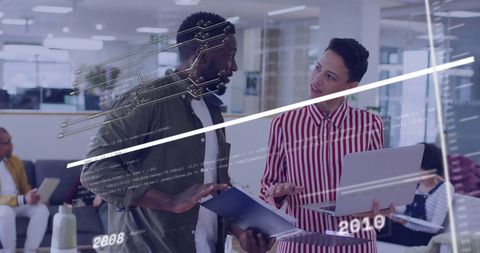 Diverse team collaborating in digital business environment