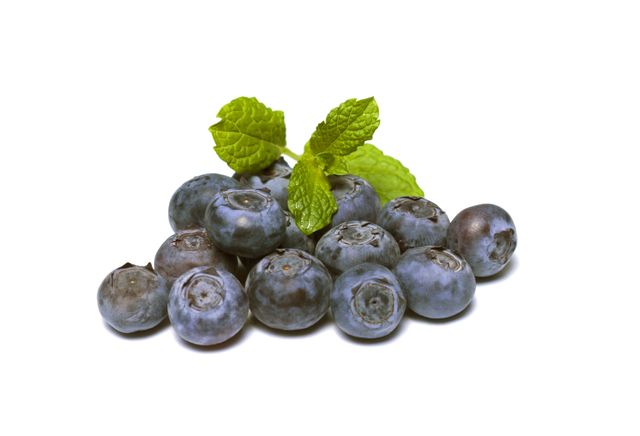 Close-up of Blueberries Against White Background - Download Free Stock Photos Pikwizard.com
