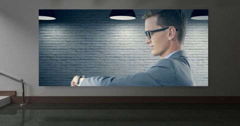 Businessman Checking Time on Smartwatch in Modern Office Lobby - Download Free Stock Images Pikwizard.com
