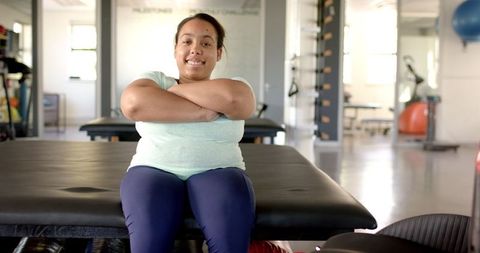 Smiling Woman in Rehabilitation Center, Embracing Wellness Journey