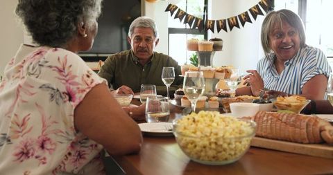 Senior Friends Celebrating at a Cozy Retirement Party
