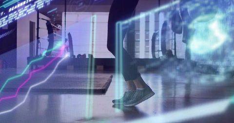 Female jumping in gym wearing grey sneakers and cropped leggings with neon HUD overlay