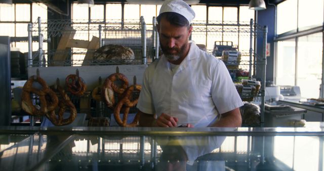 Male Baker in Uniform Working in a Modern Bakery - Download Free Stock Images Pikwizard.com