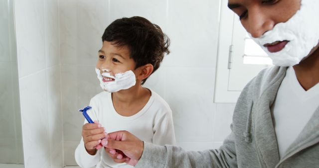 Father Teaching Young Son How to Shave in Bathroom - Download Free Stock Images Pikwizard.com