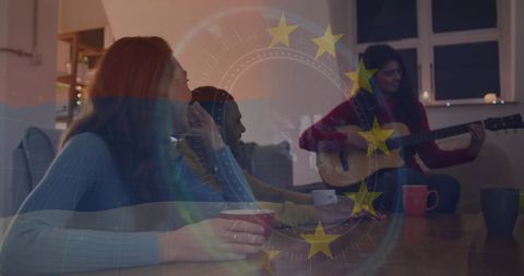 Diverse friends enjoying music and coffee together indoors