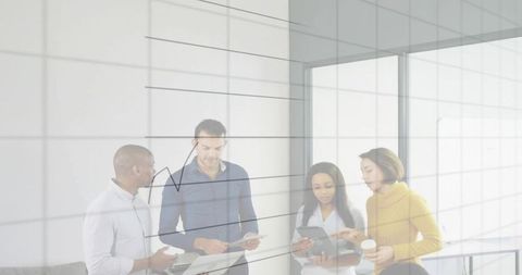Business team collaborating over tablet with finance growth chart overlay
