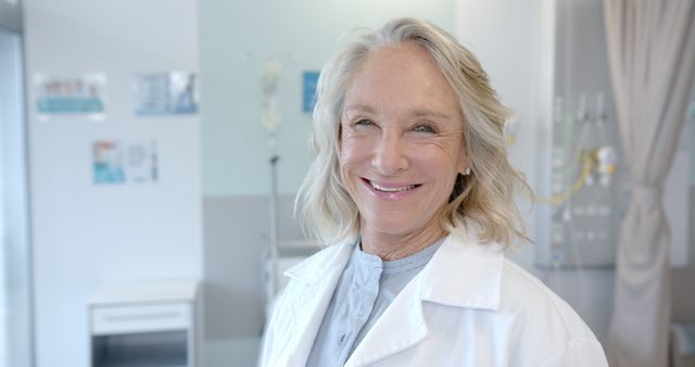 Smiling Elderly Female Doctor in Medical Clinic - Download Free Stock Images Pikwizard.com