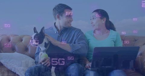 Couple with dog enjoying wireless 5g technology at home