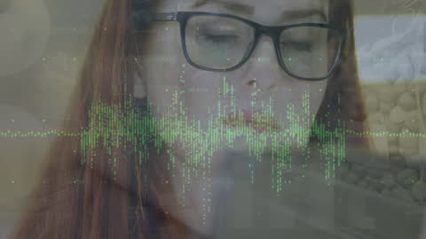 Woman Analyzing Financial Data with Tablet Overlay Graphics