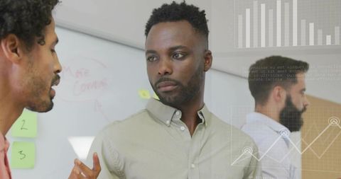 Business Professionals Analyzing Data in Office Setting