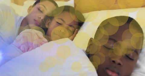 Mother and children sleeping peacefully, dreamlight bubbles