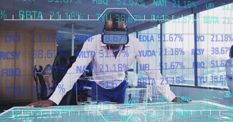 Businessman Engaging with Virtual Reality Data Analyses in Modern Office