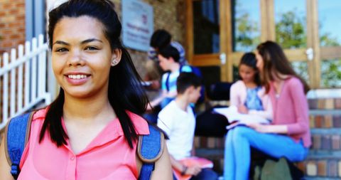 Confident Schoolgirl Smiling on Campus - Download Free Stock Images Pikwizard.com