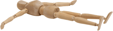 Transparent Wooden Figurine in Relaxation Pose Lying on Floor