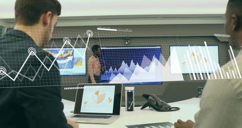 Corporate Team Analyzing Business Analytics Display Projection