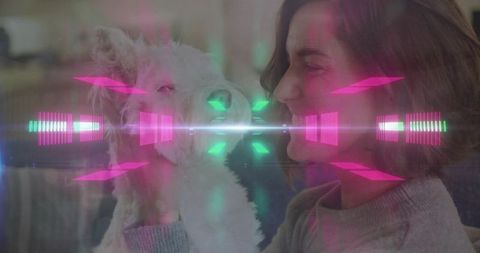 Woman cuddling fluffy puppy with neon digital overlay