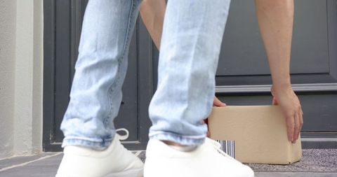 Courier Delivering Package at Doorstep, Parcels in Transit