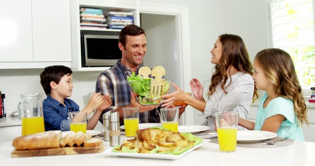 Happy Family Preparing Salad in Modern Kitchen - Download Free Stock Images Pikwizard.com