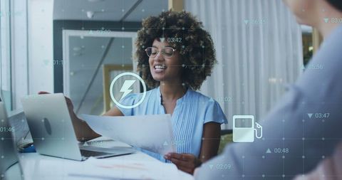 Smiling Businesswoman Analyzing Financial Data with Digital Overlay