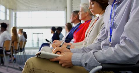 Diverse Business Professionals Taking Notes in Seminar - Download Free Stock Images Pikwizard.com