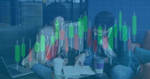 Colleagues Analyzing Financial Trends with Candlestick Chart Overlay