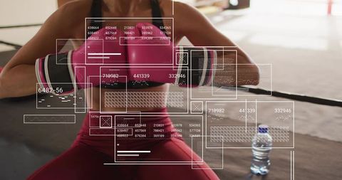 Female boxer leaning on ring rope with fitness hud analytics overlay and water bottle