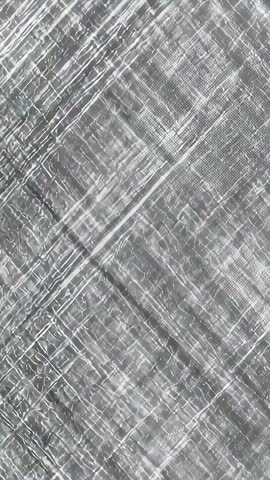 Vertical Macro Focus Shift Revealing Metallic Lattice Texture for Abstract Monochrome Background