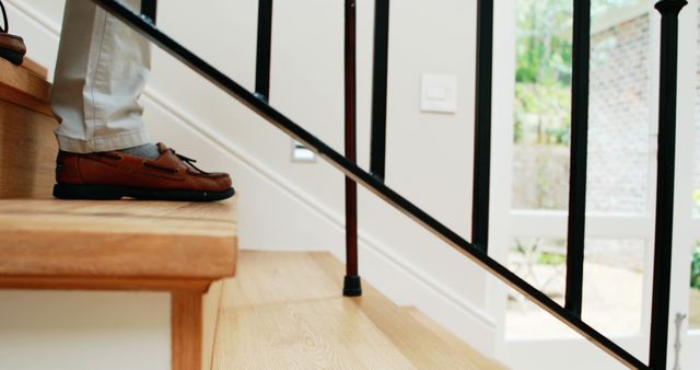 Person Climbing Wooden Stairs Indoors Wearing Leather Shoes - Download Free Stock Images Pikwizard.com