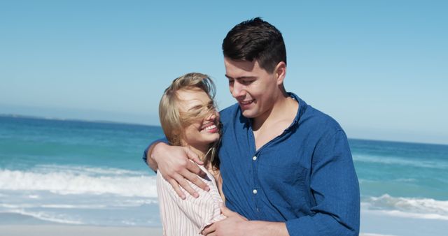 Romantic Couple Embracing on Beautiful Beach - Download Free Stock Images Pikwizard.com