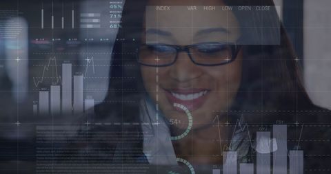Smiling Businesswoman Engaging with Digital Financial Dashboard
