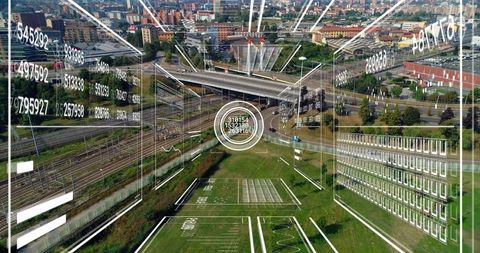 Ar hud over urban interchange showing traffic flow, rail tracks and infrastructure data