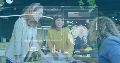 Businesswomen Collaborating with Futuristic Digital Interface