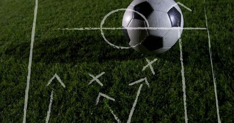 Tactical Football Strategy on Grass Field