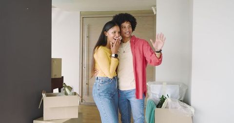 Happy Couple Celebrating New Home Move-In Nov