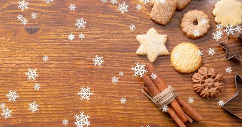 Festive Snowfall on Christmas Cookies with Rustic Decor - Download Free Stock Images Pikwizard.com