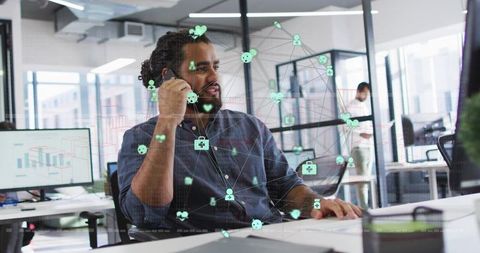Business professional talking on phone with holographic data network overlay in office
