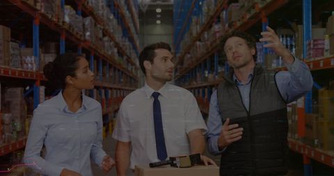 Warehouse Workers Analyzing Financial Data Overlay During Logistics Planning - Download Free Stock Images Pikwizard.com