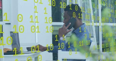 Modern Communication: Man on Phone and Laptop with Binary Overlay