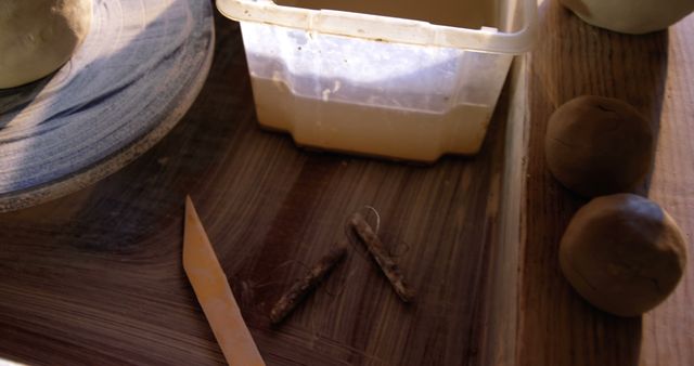 Close-up of Pottery Tools and Clay on Wooden Table - Download Free Stock Images Pikwizard.com