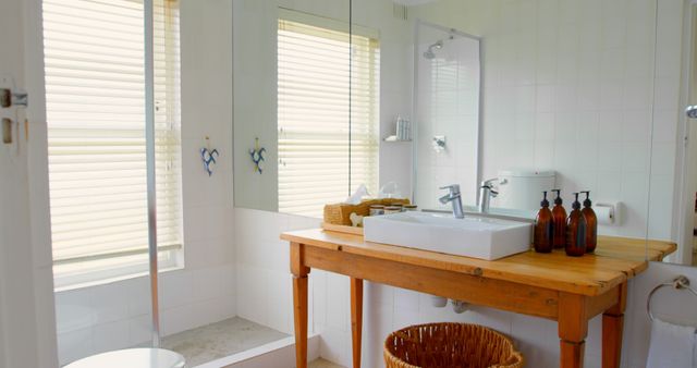 Modern Bathroom with Sink and Wooden Accents - Download Free Stock Images Pikwizard.com