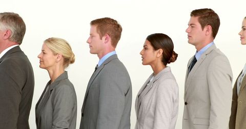 Diverse Team in Business Attire Emphasizing Corporate Hierarchy - Download Free Stock Images Pikwizard.com