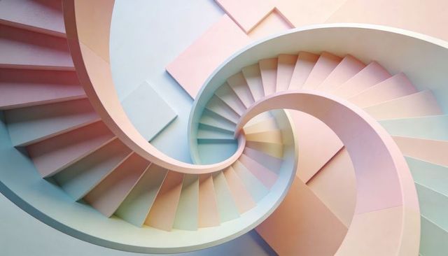 Spiraling Pastel Helix Staircase Creating Smooth Sculptural Geometry and Symmetrical Flow