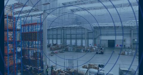 Logistics Team Organizing Cargo and Inventory in Spacious Warehouse