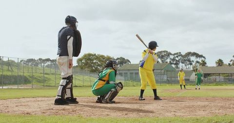 Competitive women's softball game in action