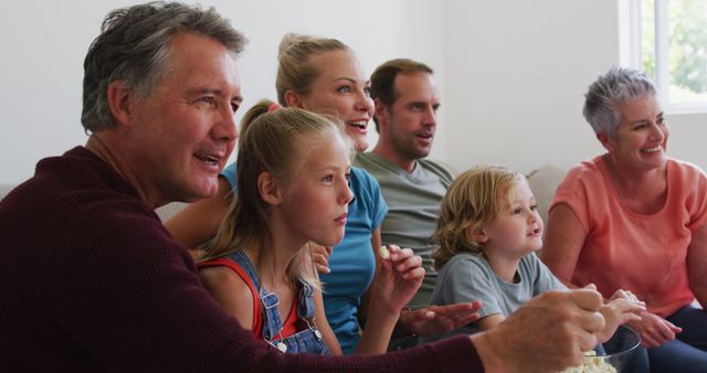 Multigenerational Family Enjoying Movie Night Together - Download Free Stock Images Pikwizard.com