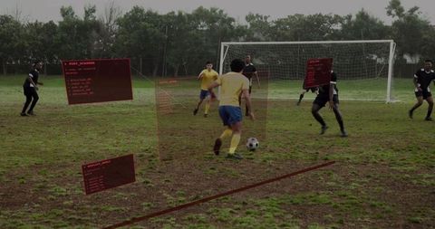 Youth soccer player dribbling toward goal with augmented reality performance hud overlay