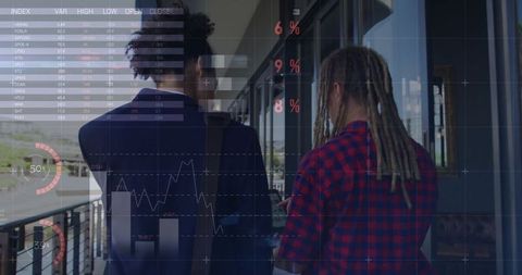 Diverse Business Professionals Analyzing Financial Data Outdoors