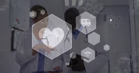 Doctors Utilizing Digital Technology for Patient Data Review