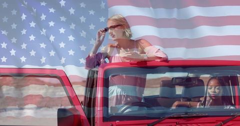 Multicultural Friends Enjoying Road Trip with USA Flag Transparency
