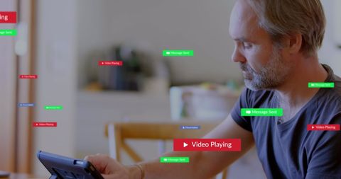caucasian man engaging with tablet among digital notifications - Download Free Stock Images Pikwizard.com
